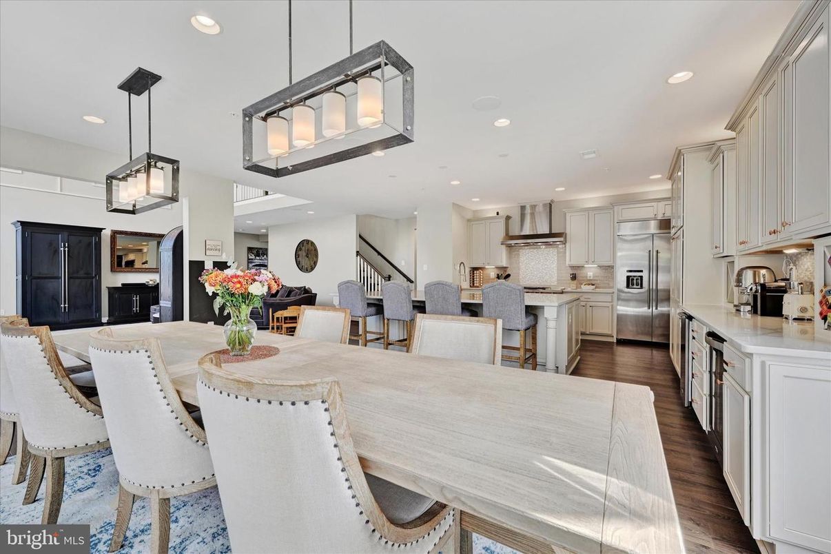 Dining room, Interior, Kitchen, Pendant Lights, Recessed Lighting, Stainless Steel Appliances, Wood Texture Flooring