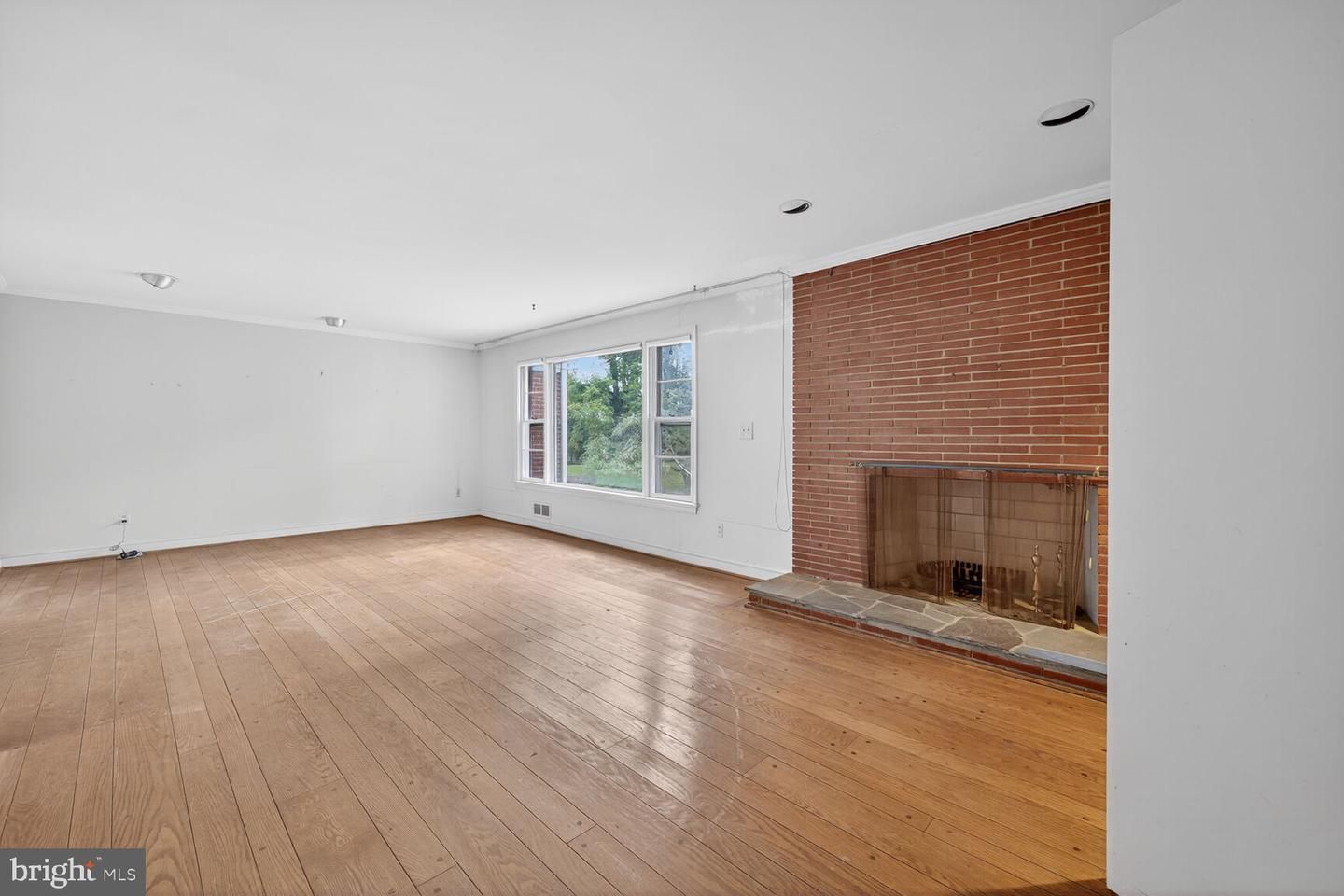 Empty room, Fireplace, Interior, Recessed Lighting, Stone Walls, Wood Texture Flooring
