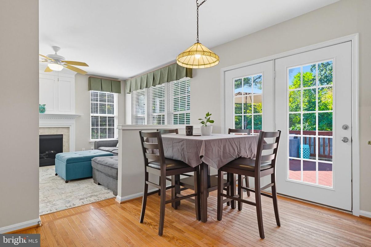 Dining room, Fireplace, Interior, Pendant Lights, Wood Texture Flooring
