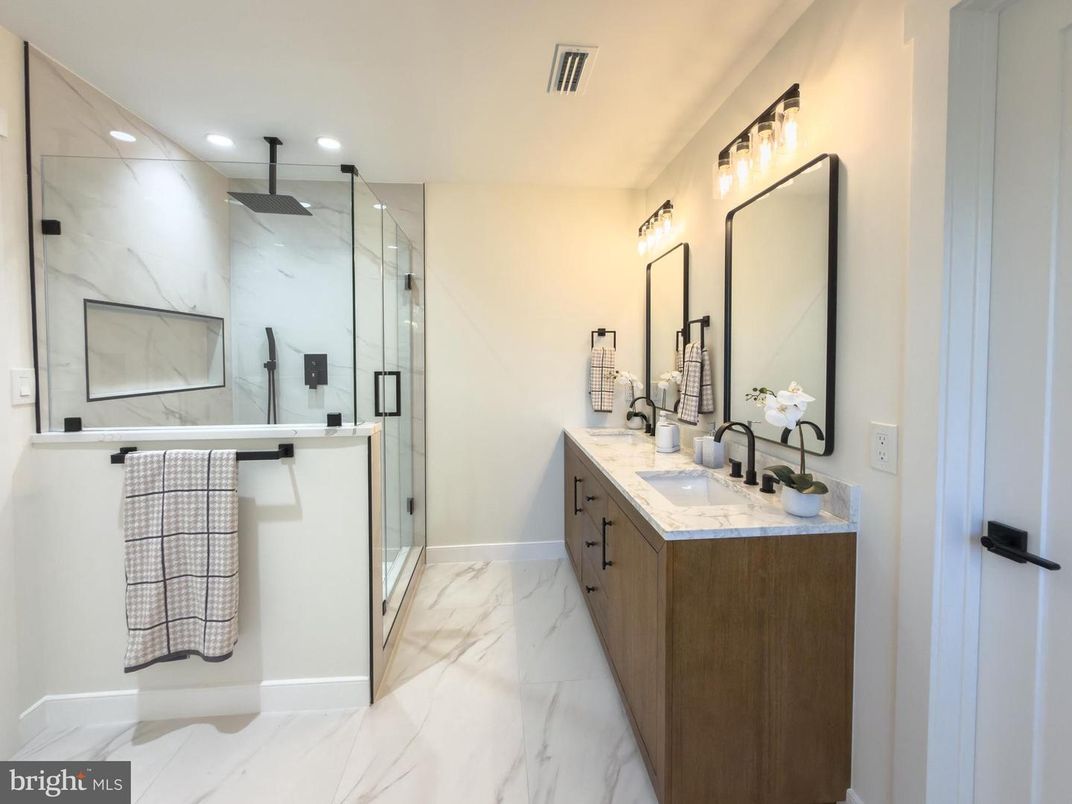 Bathroom, Dual Sink Vanities, Glass Shower, Interior, Marble, Marble Walls, Recessed Lighting