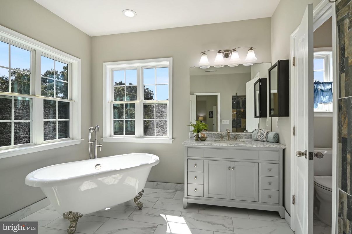 Bathroom, Dual Sink Vanities, Free Standing Baths, Interior, Marble, Recessed Lighting