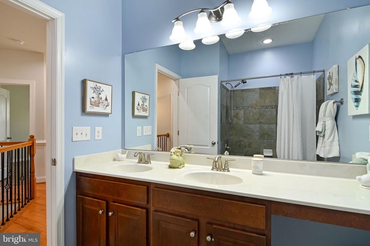 Bathroom, Dual Sink Vanities, Interior, Recessed Lighting, Wood Texture Flooring