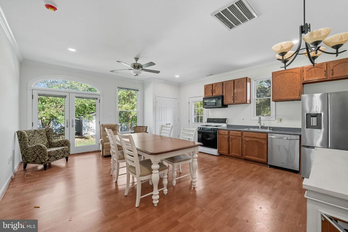 Dining room, Interior, Kitchen, Recessed Lighting, Stainless Steel Appliances, Wood Texture Flooring