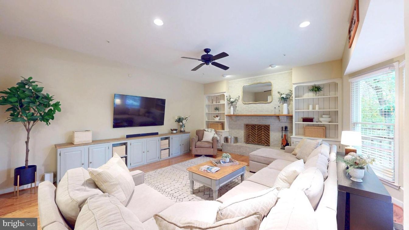 Fireplace, Interior, Living room, Recessed Lighting, Stone Walls, Wood Texture Flooring