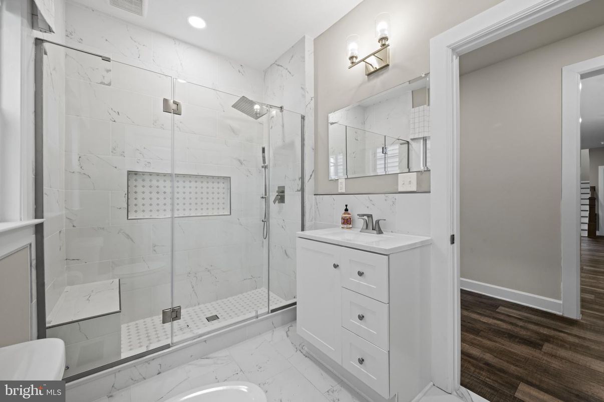 Bathroom, Glass Shower, Interior, Marble, Marble Walls, Recessed Lighting, Wood Texture Flooring