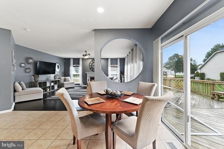 Dining room, Fireplace, Interior, Living room, Recessed Lighting, Wood Texture Flooring
