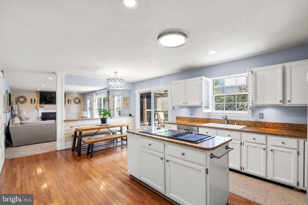 Chandelier, Dining room, Fireplace, Interior, Kitchen, Living room, Recessed Lighting, Wood Texture Flooring
