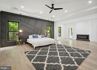 Bedroom, Fireplace, Interior, Pendant Lights, Recessed Lighting, Wood Texture Flooring