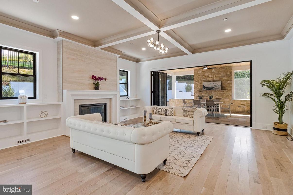 Fireplace, Interior, Living room, Recessed Lighting, Stone Walls, Wood Texture Flooring