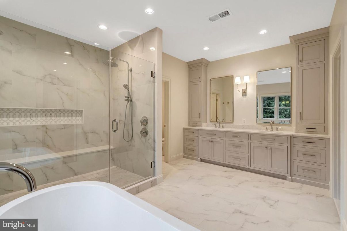 Bathroom, Dual Sink Vanities, Free Standing Baths, Glass Shower, Interior, Marble, Marble Walls, Recessed Lighting