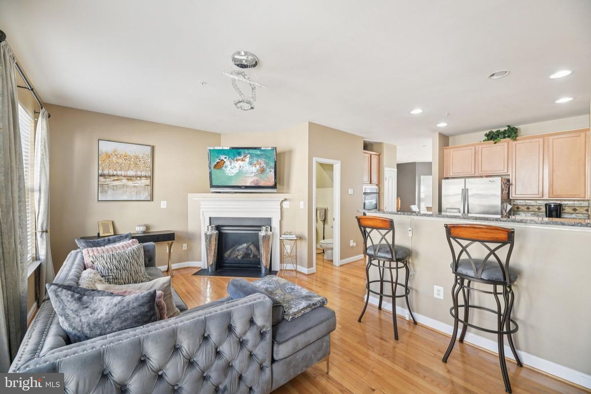 Fireplace, Interior, Kitchen, Living room, Recessed Lighting, Wood Texture Flooring