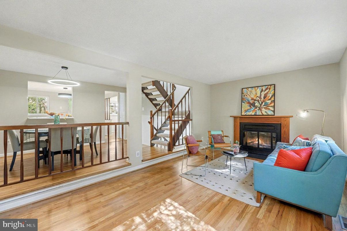 Dining room, Fireplace, Interior, Living room, Pendant Lights, Wood Texture Flooring