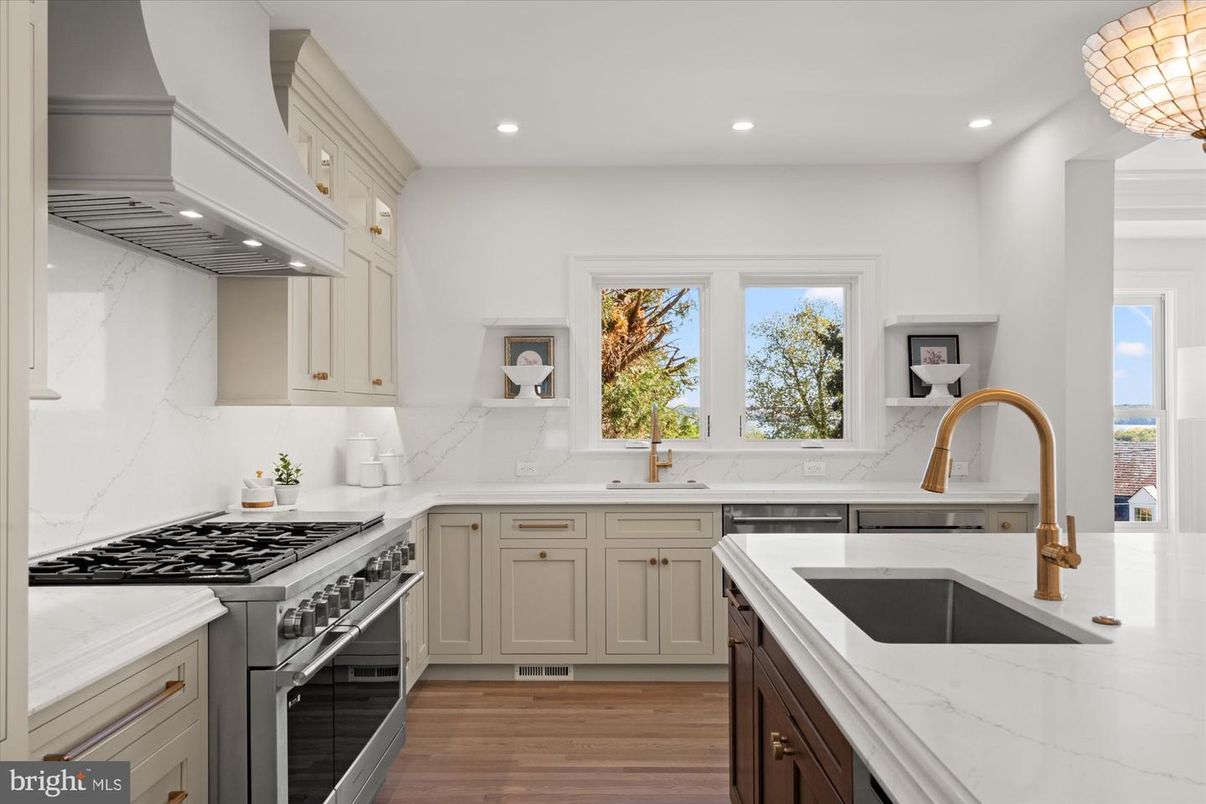 Interior, Kitchen, Marble Walls, Recessed Lighting, Stainless Steel Appliances, Wood Texture Flooring