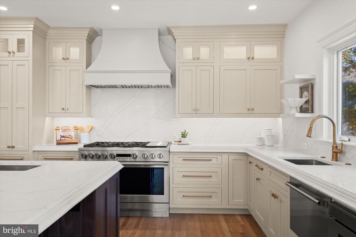 Interior, Kitchen, Marble Walls, Recessed Lighting, Stainless Steel Appliances, Wood Texture Flooring