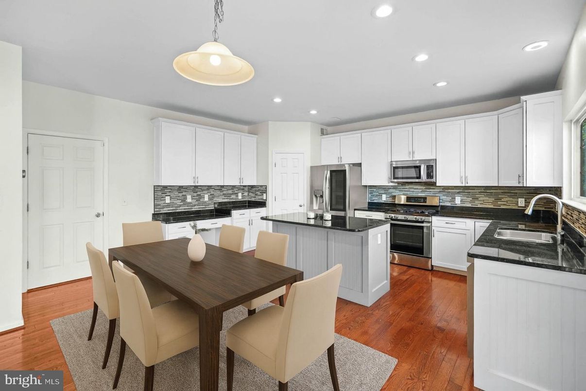 Dining room, Interior, Kitchen, Pendant Lights, Recessed Lighting, Stainless Steel Appliances, Wood Texture Flooring