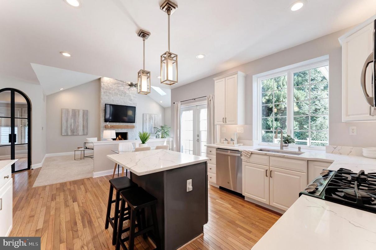 Dining room, Fireplace, Interior, Kitchen, Pendant Lights, Recessed Lighting, Stainless Steel Appliances, Wood Texture Flooring
