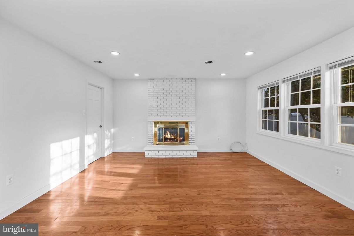 Empty room, Fireplace, Interior, Recessed Lighting, Wood Texture Flooring