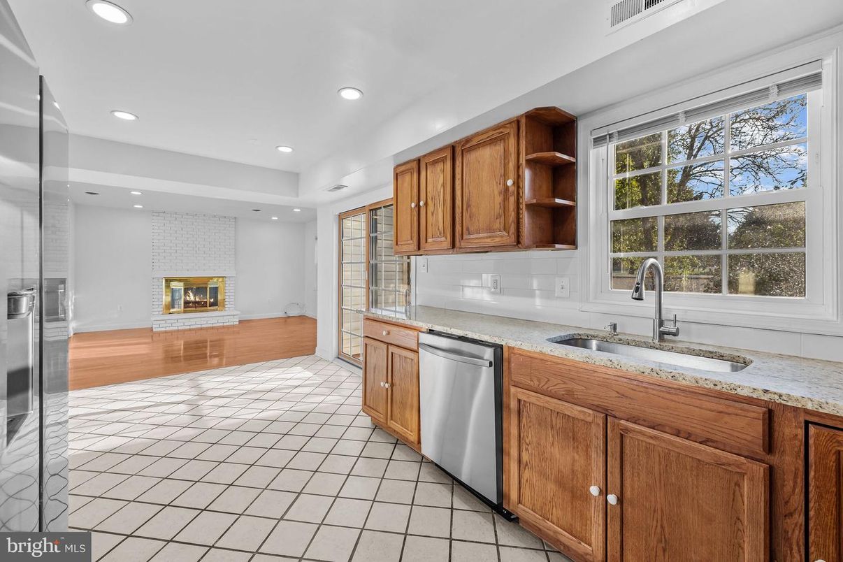 Fireplace, Interior, Kitchen, Recessed Lighting, Stainless Steel Appliances, Wood Texture Flooring