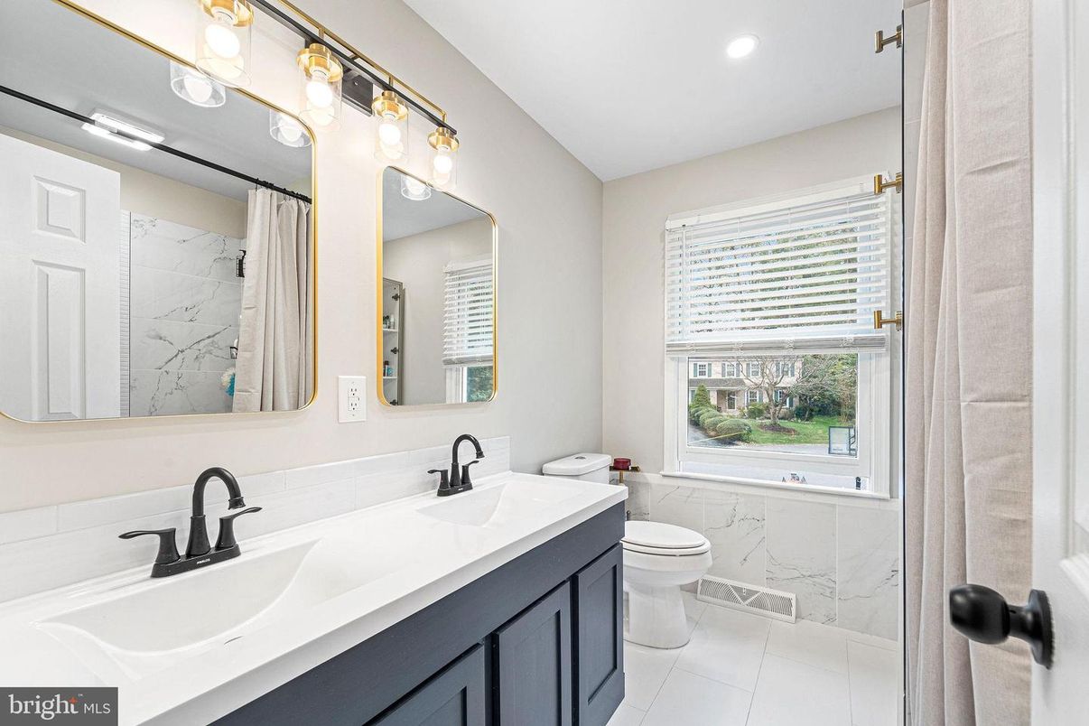 Bathroom, Dual Sink Vanities, Interior, Marble Walls, Recessed Lighting