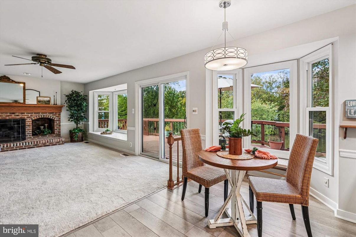 Dining room, Fireplace, Interior, Pendant Lights, Wood Texture Flooring