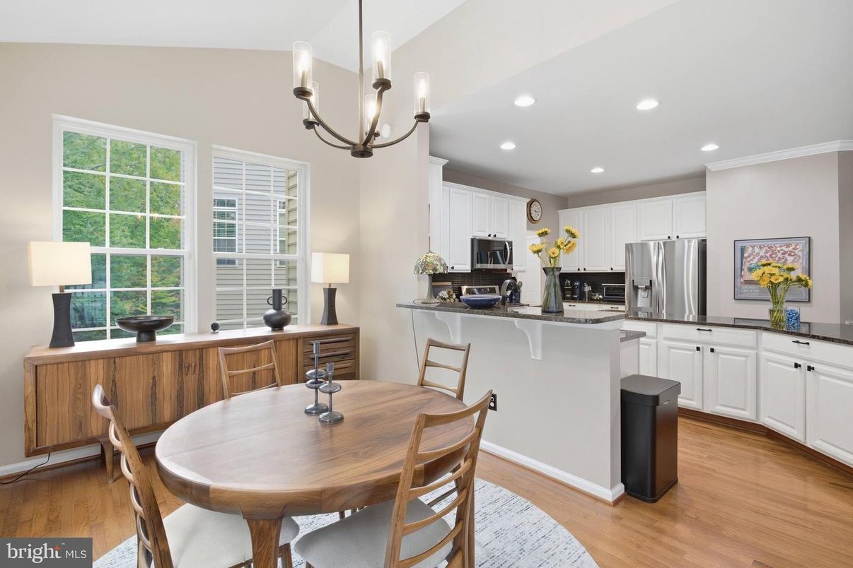 Chandelier, Dining room, Interior, Kitchen, Recessed Lighting, Stainless Steel Appliances, Wood Texture Flooring