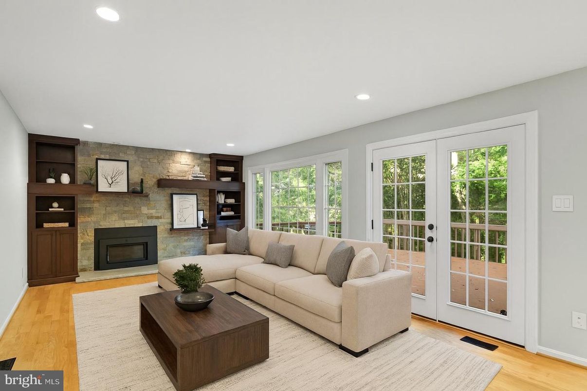 Fireplace, Interior, Living room, Recessed Lighting, Stone Walls, Wood Texture Flooring