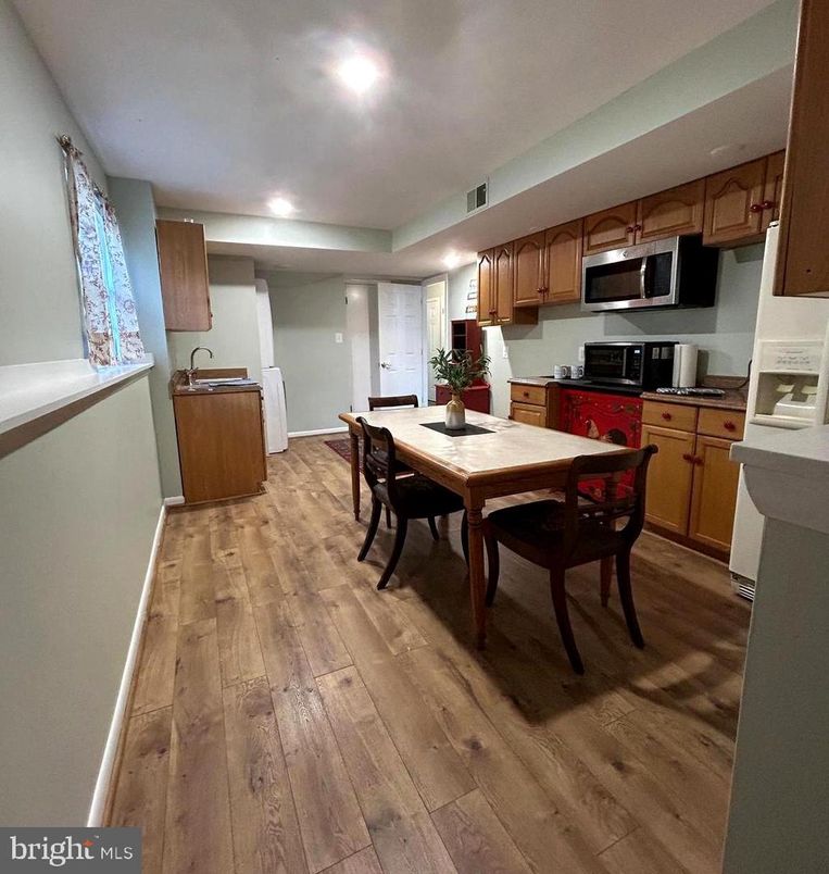 Dining room, Interior, Kitchen, Recessed Lighting, Stainless Steel Appliances, Wood Texture Flooring