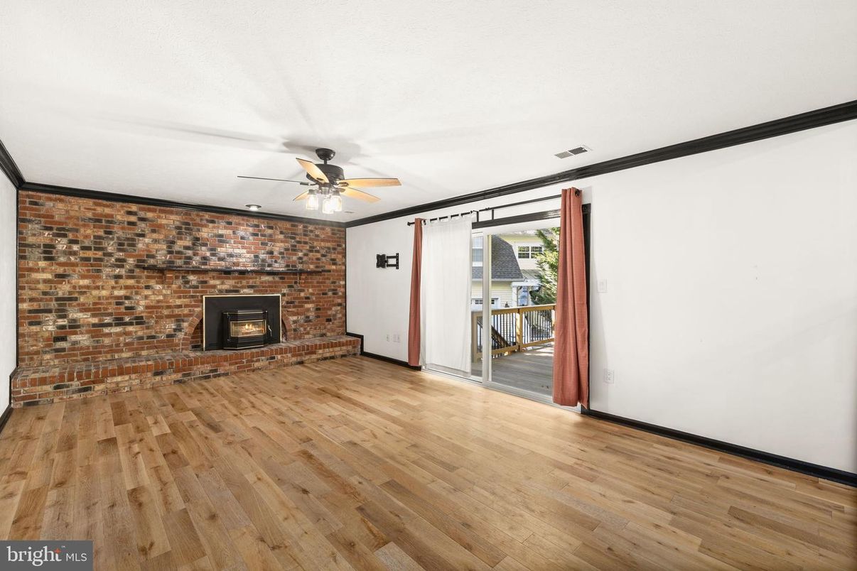 Empty room, Fireplace, Interior, Stone Walls, Wood Texture Flooring