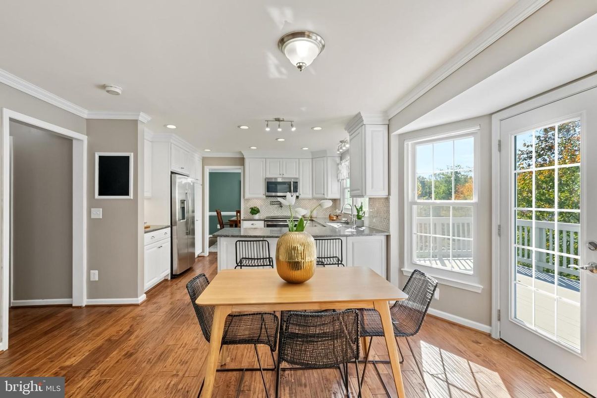 Dining room, Interior, Kitchen, Recessed Lighting, Stainless Steel Appliances, Wood Texture Flooring