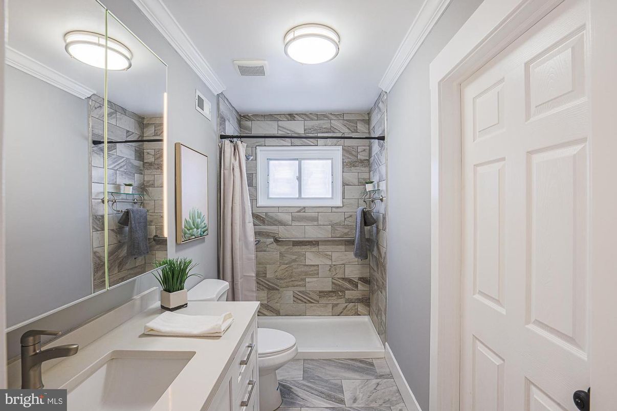 Bathroom, Dual Sink Vanities, Glass Shower, Interior, Marble, Stone Walls