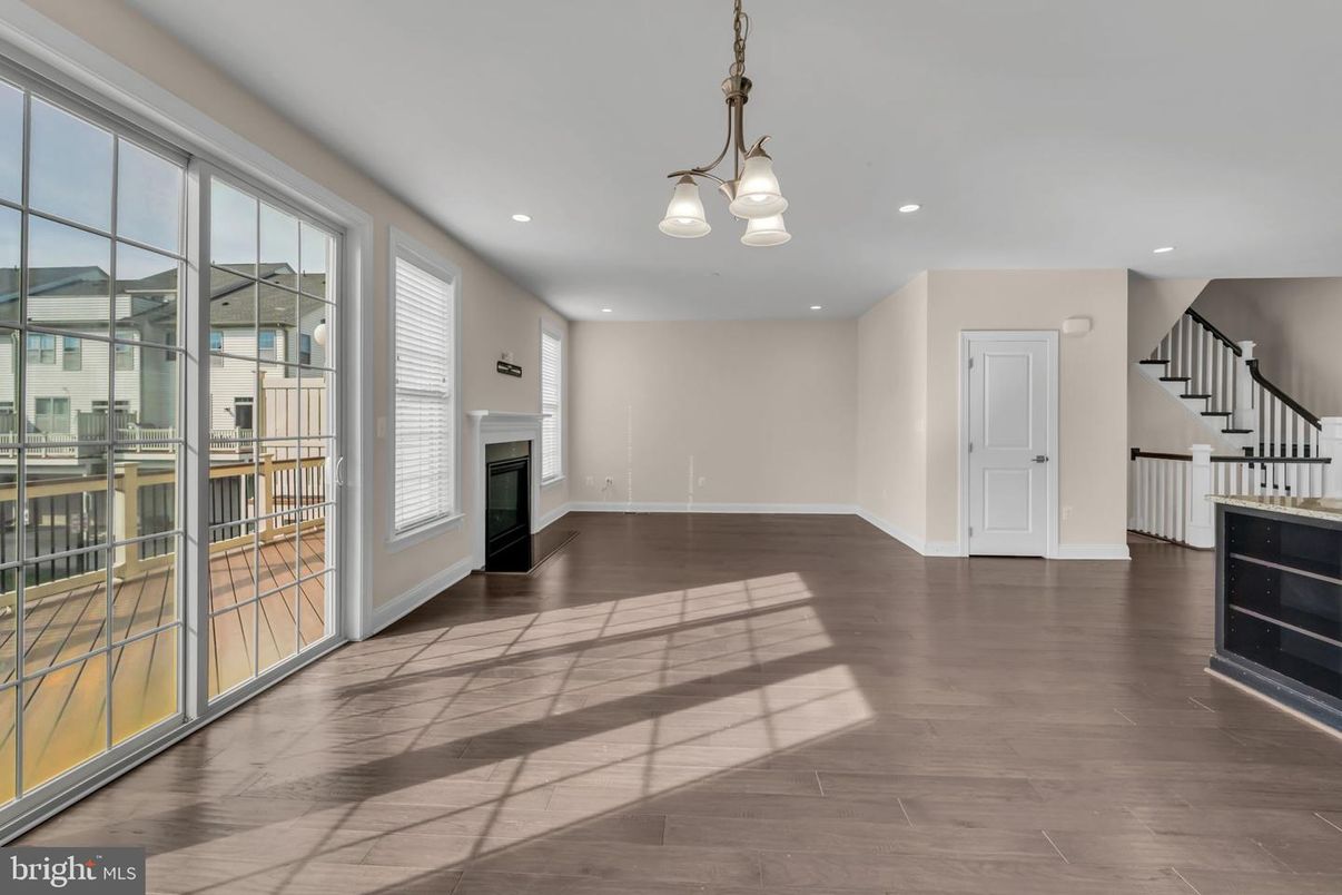 Empty room, Fireplace, Interior, Pendant Lights, Recessed Lighting, Wood Texture Flooring