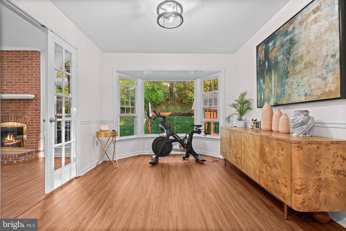 Fireplace, Fitness Equipment, Interior, Stone Walls, Wood Texture Flooring