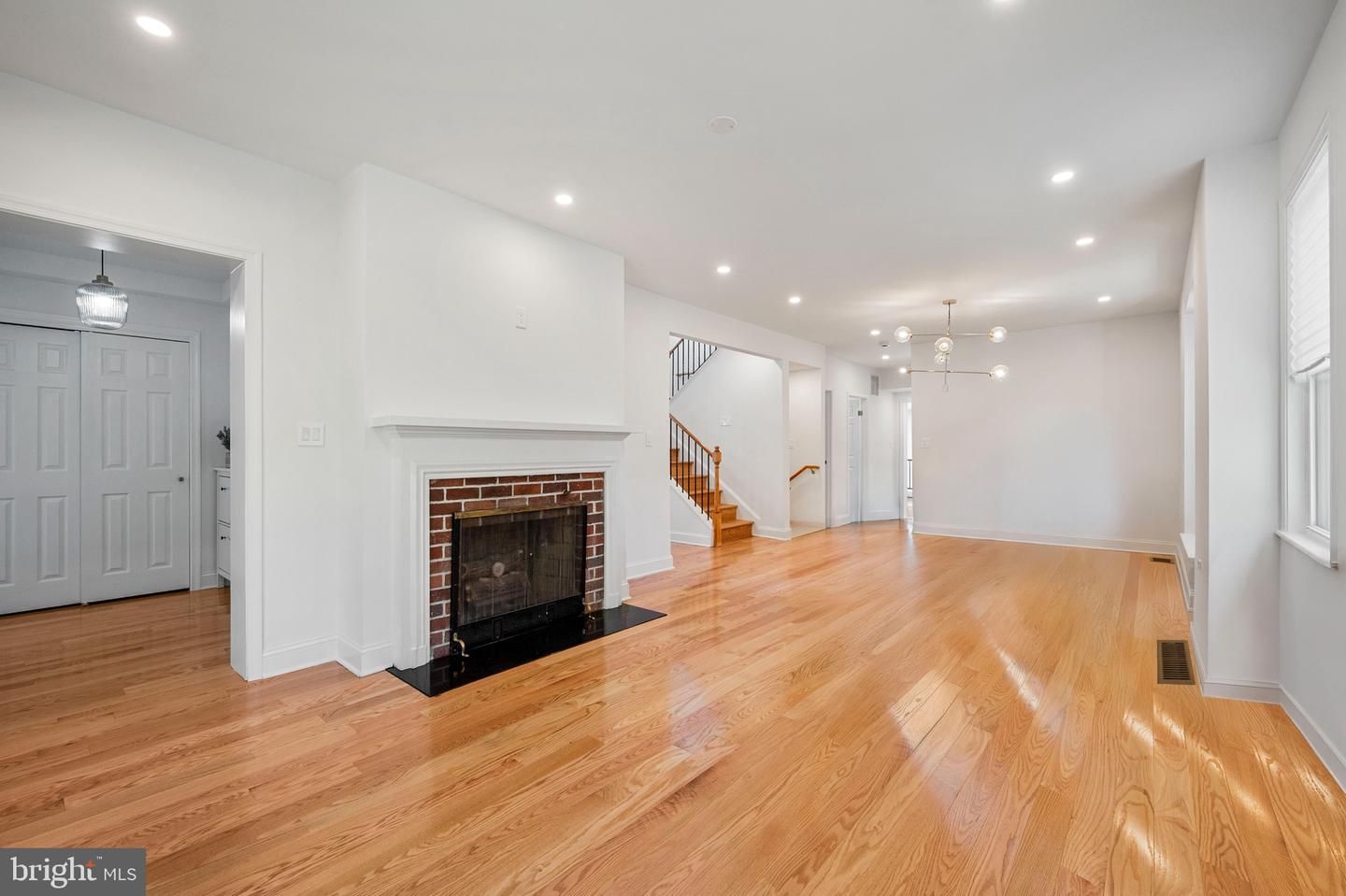 Empty room, Fireplace, Interior, Pendant Lights, Recessed Lighting, Wood Texture Flooring