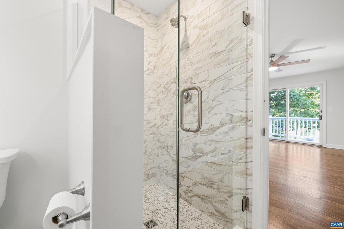 Bathroom, Glass Shower, Interior, Marble Walls, Wood Texture Flooring
