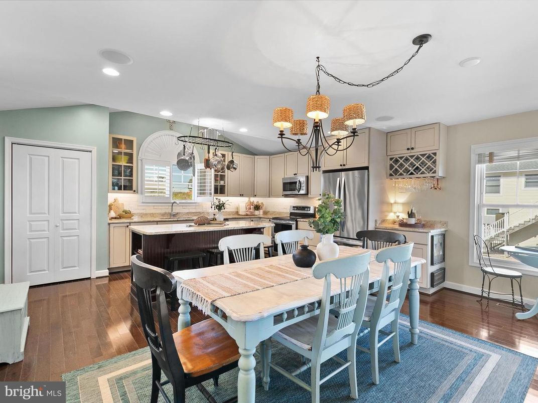 Chandelier, Dining room, Interior, Kitchen, Recessed Lighting, Stainless Steel Appliances, Wood Texture Flooring