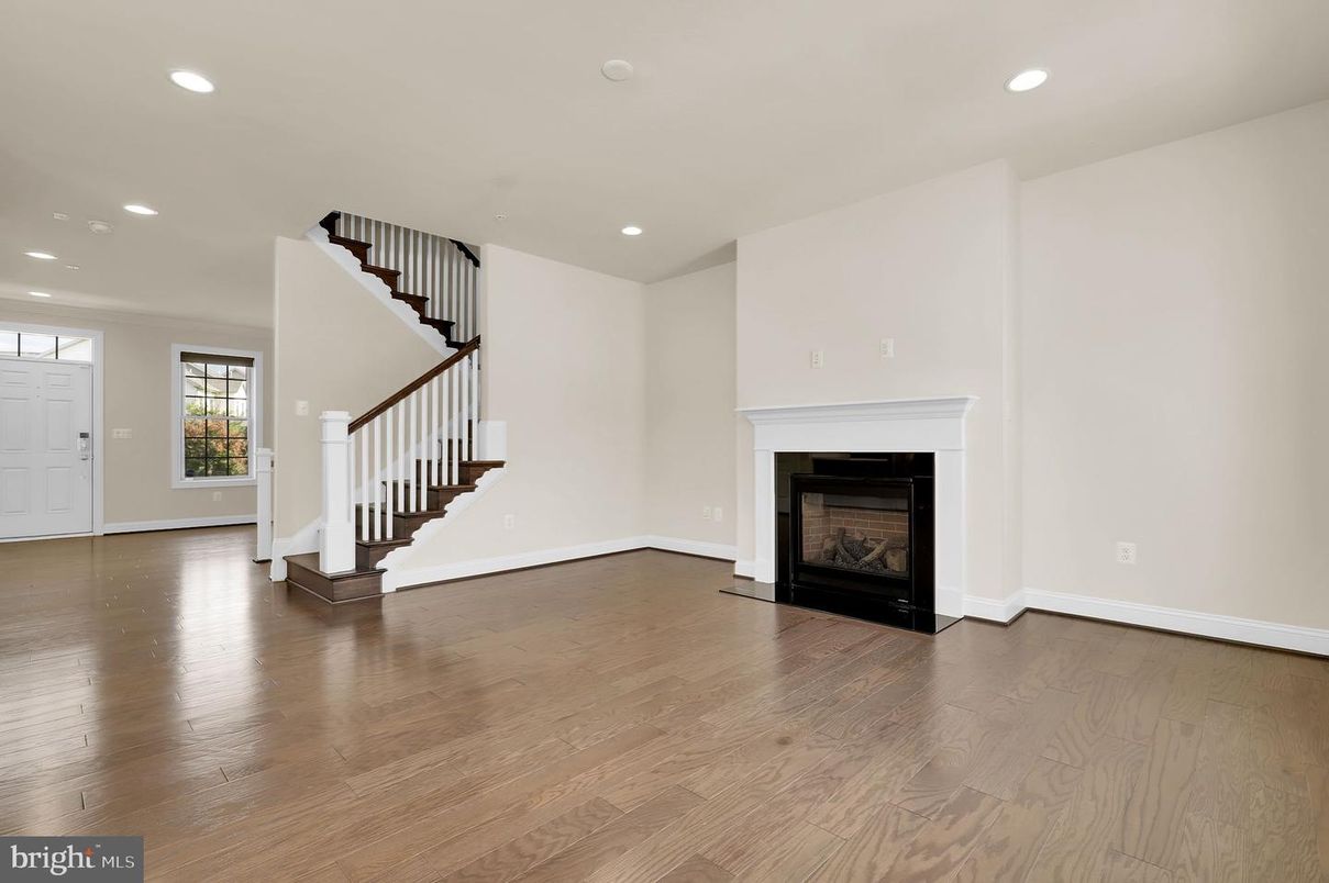 Empty room, Fireplace, Interior, Recessed Lighting, Wood Texture Flooring