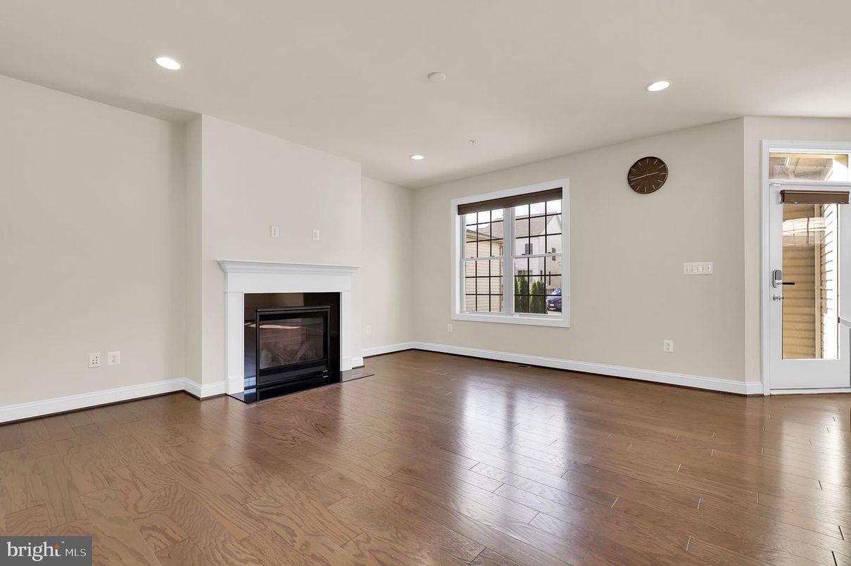 Empty room, Fireplace, Interior, Recessed Lighting, Wood Texture Flooring