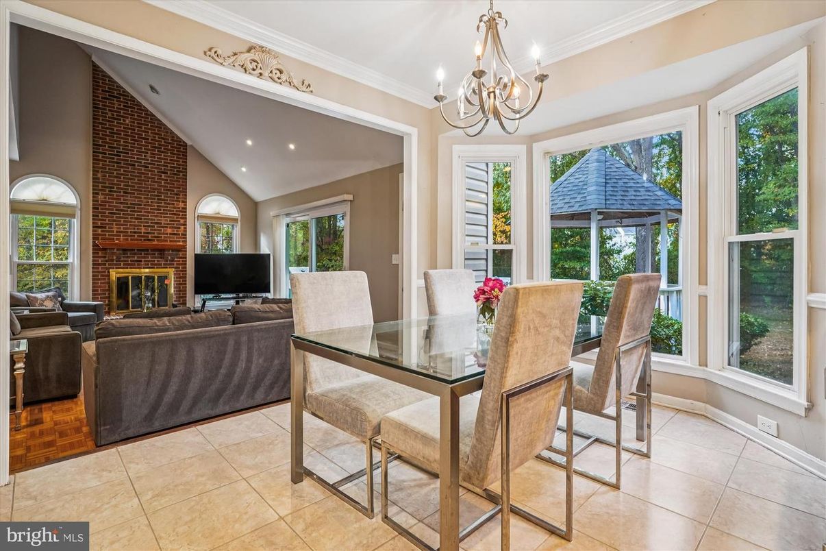 Chandelier, Dining room, Fireplace, Interior, Living room, Recessed Lighting, Stone Walls