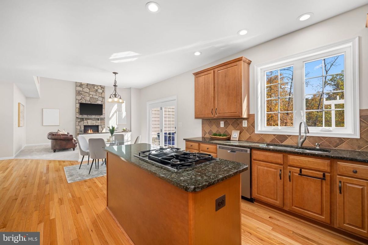 Dining room, Fireplace, Interior, Kitchen, Pendant Lights, Recessed Lighting, Wood Texture Flooring
