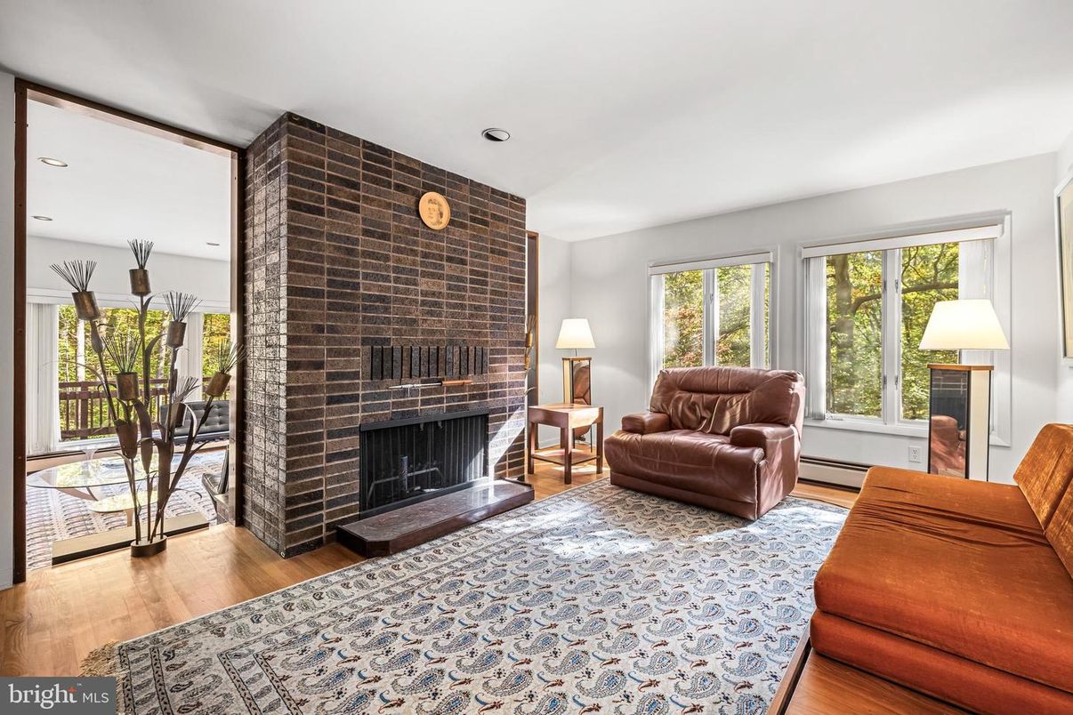 Fireplace, Interior, Living room, Recessed Lighting, Stone Walls, Wood Texture Flooring