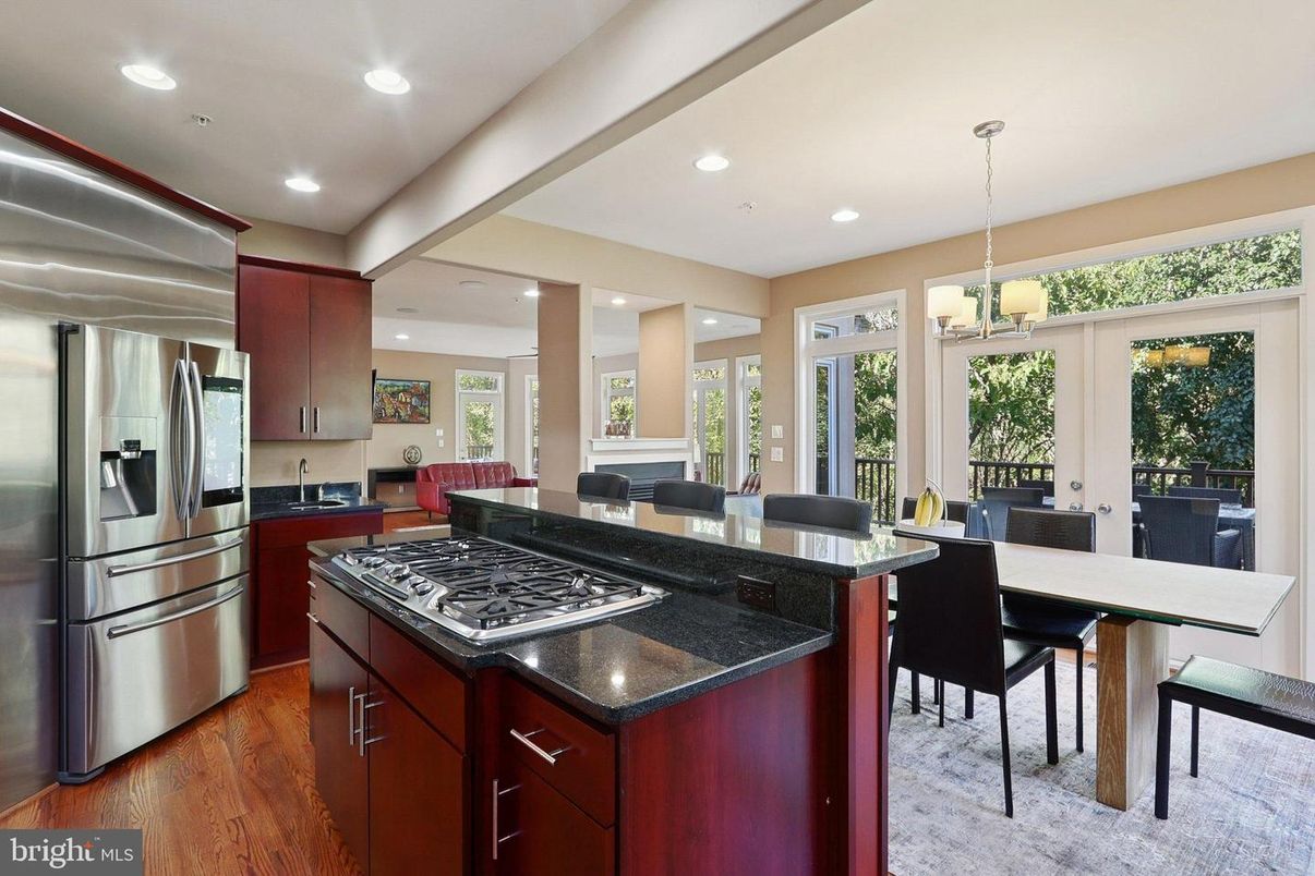 Dining room, Interior, Kitchen, Pendant Lights, Recessed Lighting, Stainless Steel Appliances, Wood Texture Flooring