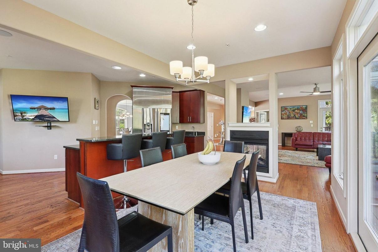 Chandelier, Dining room, Fireplace, Interior, Kitchen, Living room, Recessed Lighting, Wood Texture Flooring