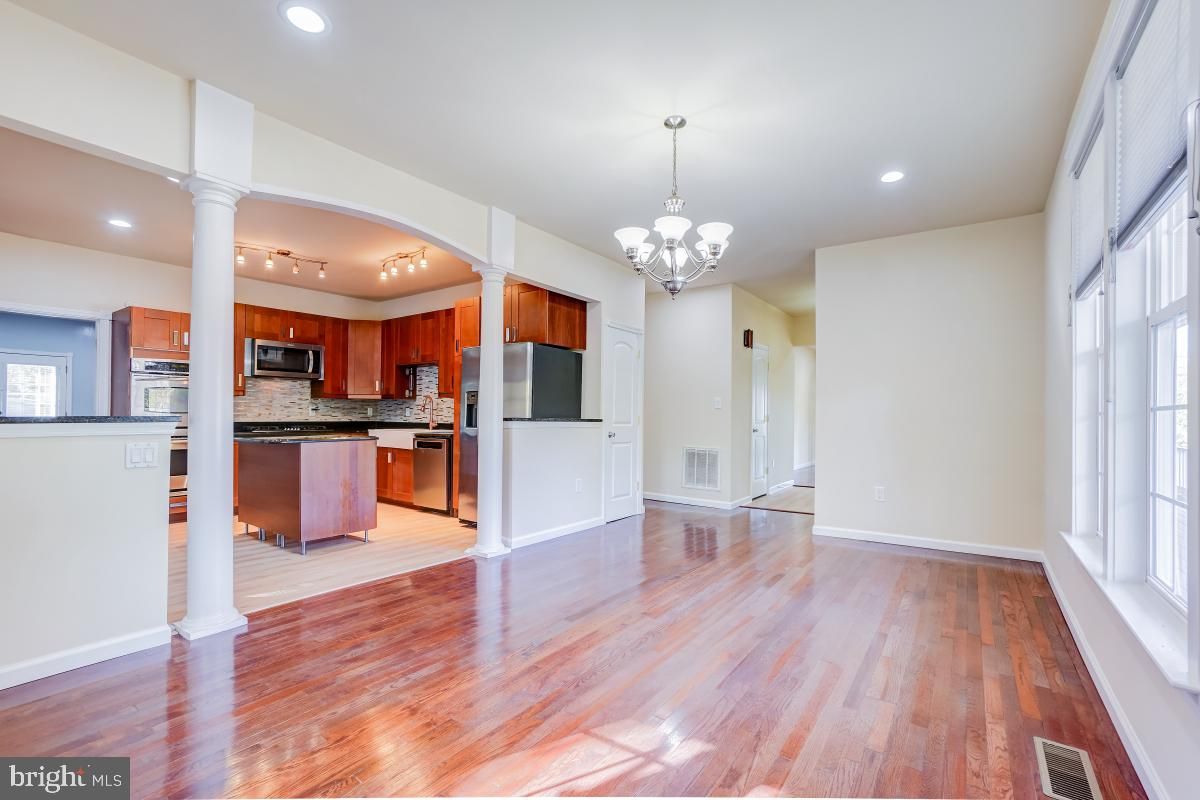 Chandelier, Interior, Kitchen, Recessed Lighting, Stainless Steel Appliances, Wood Texture Flooring