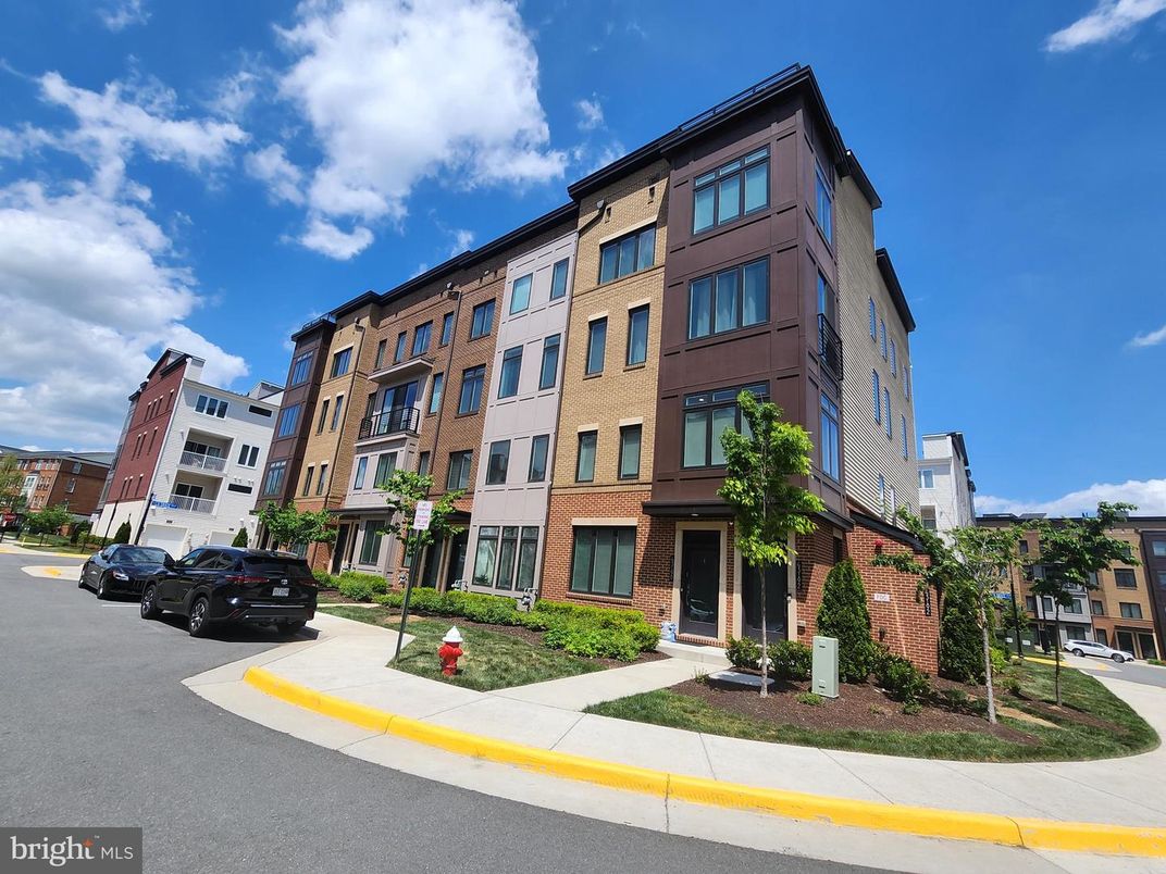 Exterior, Facade, Brick Facade, Condo Building