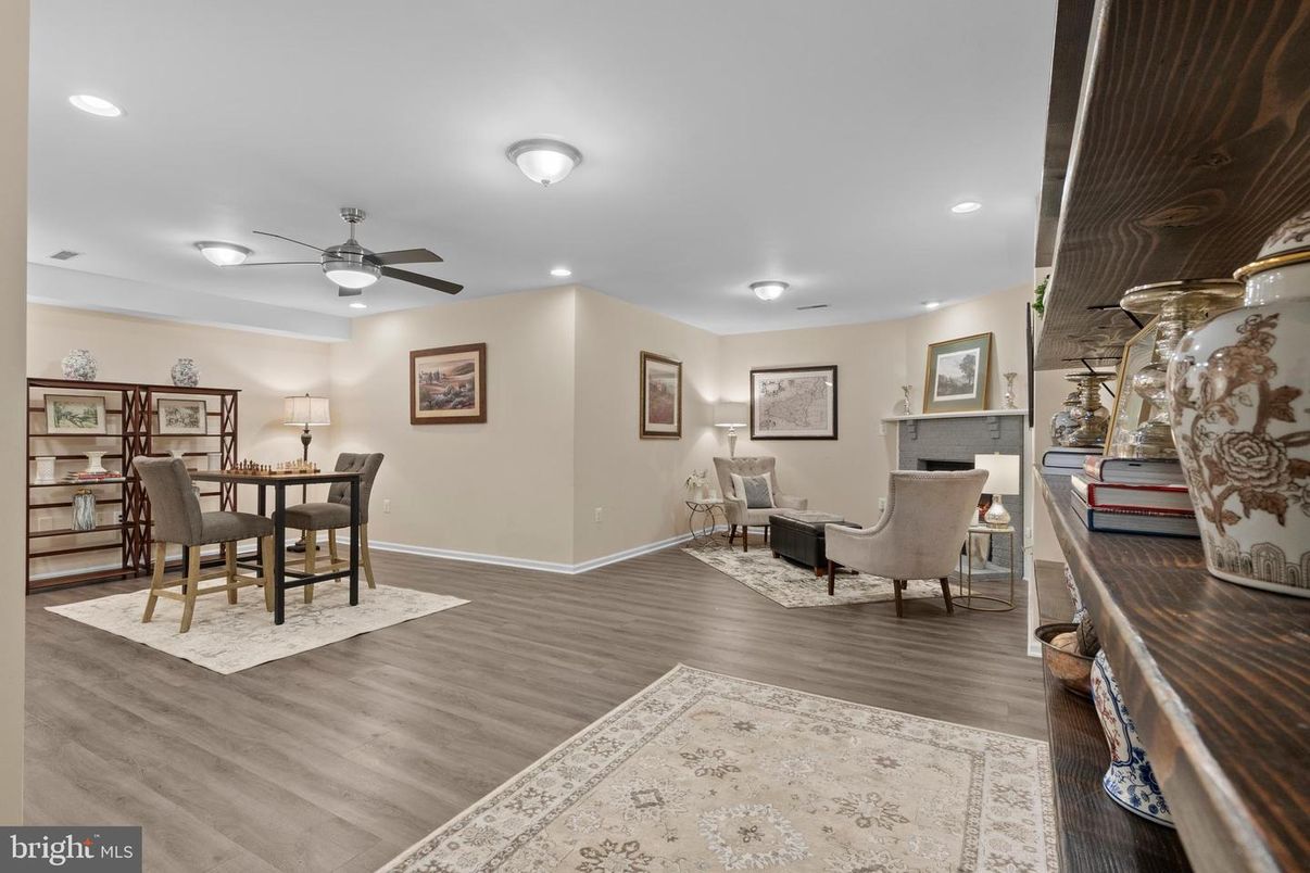 Dining room, Fireplace, Interior, Living room, Recessed Lighting, Wood Texture Flooring