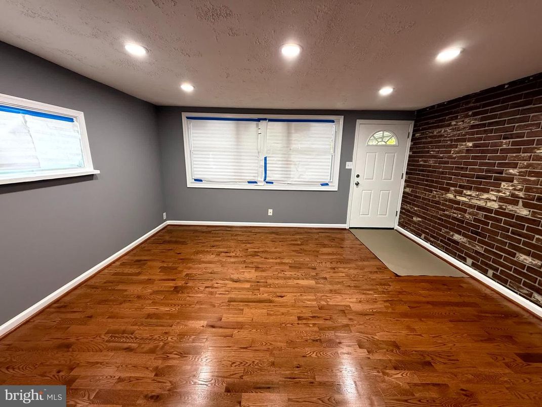 Empty room, Interior, Recessed Lighting, Stone Walls, Wood Texture Flooring