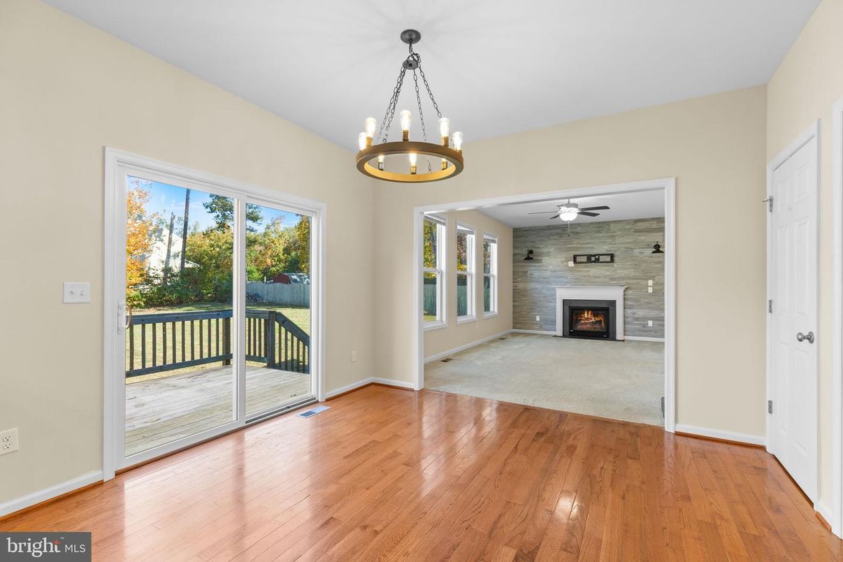 Empty room, Fireplace, Interior, Pendant Lights, Wood Texture Flooring