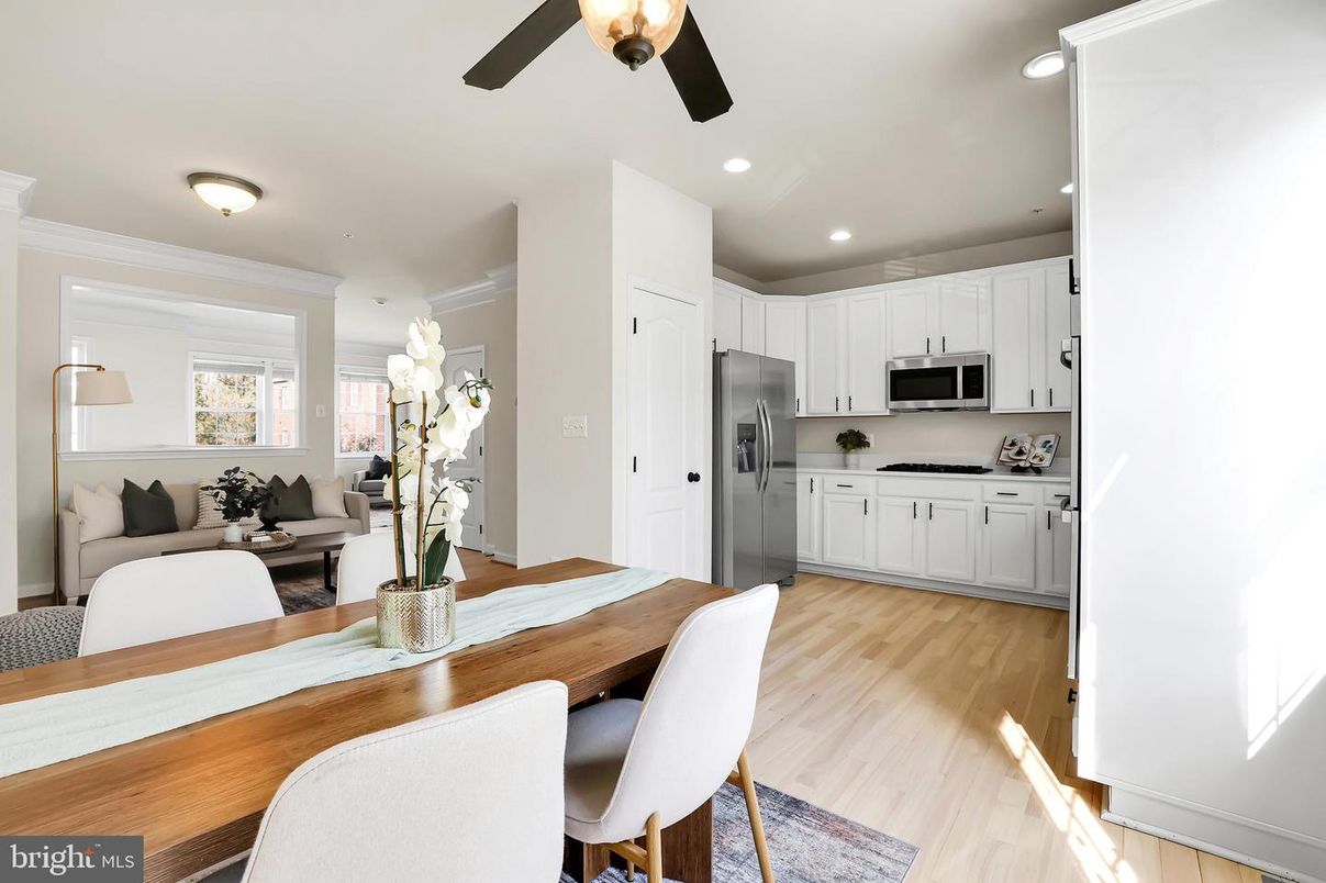 Dining room, Interior, Kitchen, Living room, Recessed Lighting, Stainless Steel Appliances, Wood Texture Flooring