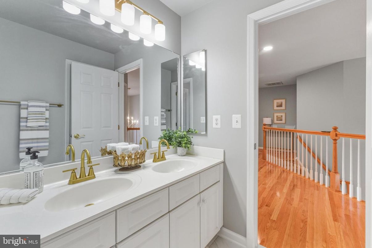 Bathroom, Dual Sink Vanities, Interior, Recessed Lighting, Wood Texture Flooring