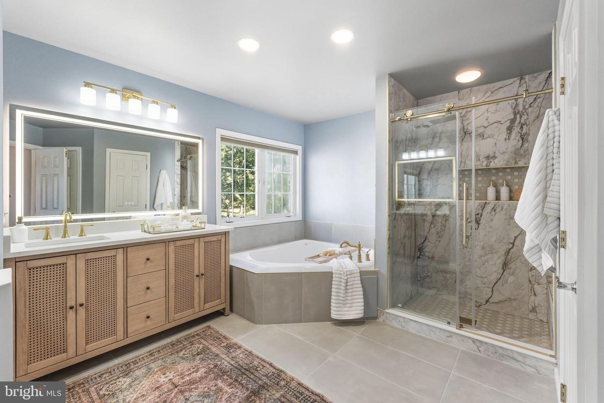 Bathroom, Dual Sink Vanities, Glass Shower, Interior, Marble Walls, Recessed Lighting